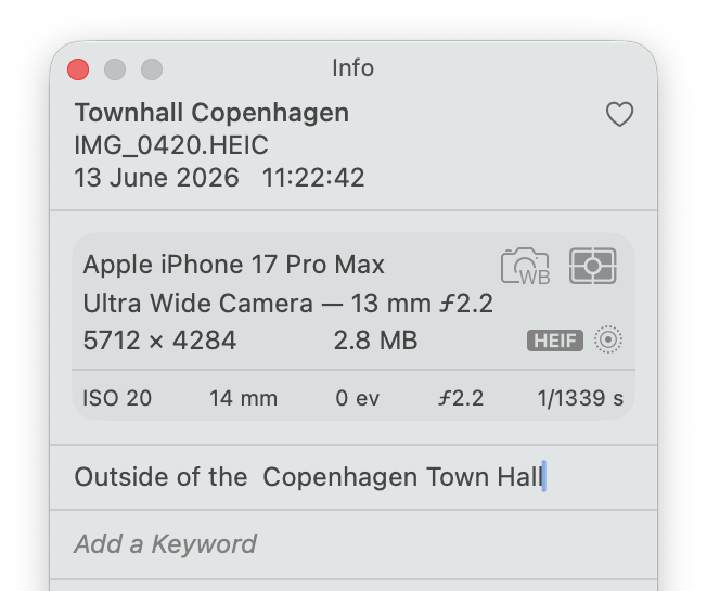 The Apple Photos Info panel (Command-I) for a photo titled "Townhall Copenhagen", shown as the bold line directly above its file name IMG_0420.HEIC; a separate Caption field lower down reads "Outside of the Copenhagen Town Hall"